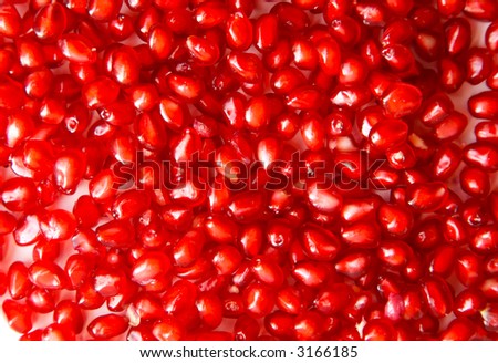 red grains of pomegranate close-up