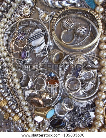 pirate's treasure, variety of golden and silver jewels