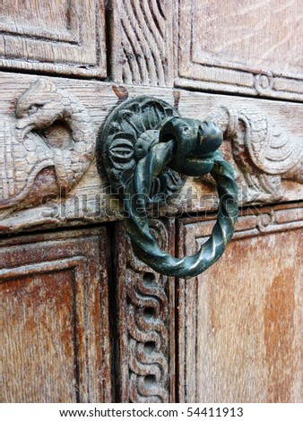 Antique door of medieval Greek church, detail center focused