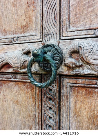 Antique door of medieval Greek church, detail center focused