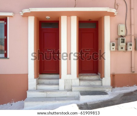 twin elegant house doors in Greece