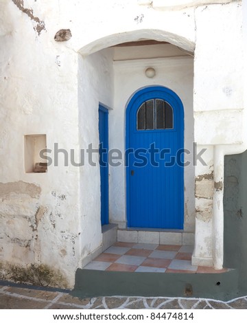 Blue house door in a Greek island