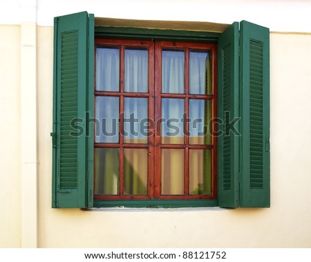 old wooden window, green shutters