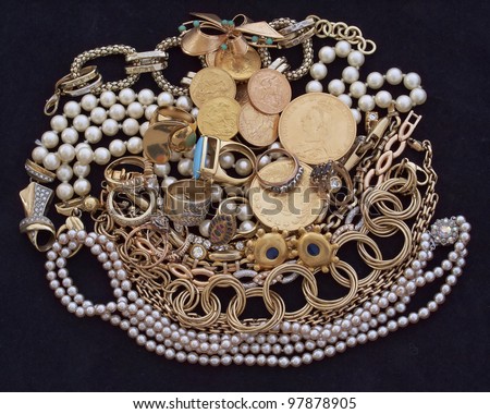 a feast of golden jewels and coins