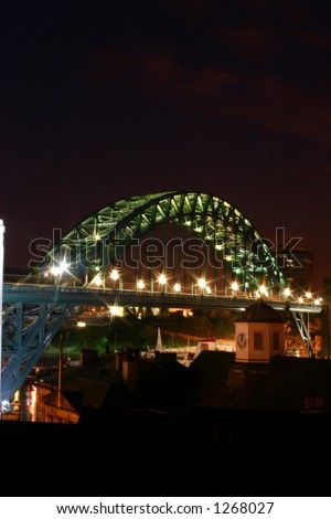 night shot of newcastle tyne bridge taken from an unusual angle