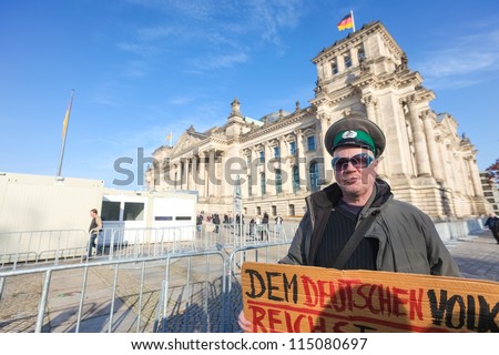 BERLIN - NOVEMBER 3: Protester in front of the Bundestag on November 3, 2011 in Berlin, Germany. Citizens are becoming more disillusioned with the current political system.
