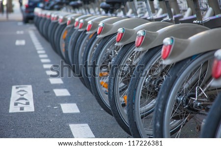 PARIS, FRANCE - JANUARY 6, 2012: Velib bucycles in the row on January 6, 2012 in Paris, France. Velib is a large-scale public bicycle sharing system in Paris, France.
