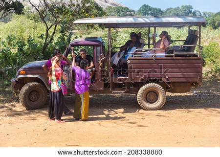 YALA NATIONAL PARK, SRI LANKA - MARCH 4, 2014: Safari jeep tour in the Yala park. Yala is the second largest national park in Sri Lanka.