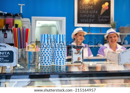 DUBROVNIK, CROATIA - MAY 26, 2014: Gossip ice cream shop on main street Stradun. It is one of the best ice cream place in town popular among tourists.