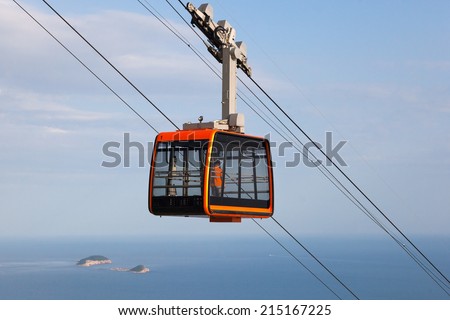 DUBROVNIK, CROATIA - MAY 26, 2014: Tourist in the Dubrovnik cable car. It connects Ploce and  mountain Srdj above town where you can enjoy a panoramic view of Old Town and the surrounding islands.