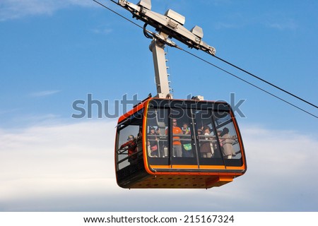 DUBROVNIK, CROATIA - MAY 26, 2014: Tourists in the Dubrovnik cable car. It connects Ploce and  mountain Srdj above town where you can enjoy a panoramic view of Old Town and the surrounding islands.