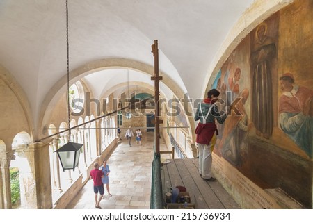 DUBROVNIK, CROATIA - MAY 26, 2014: Art conservation and restoration in the Franciscan Monastery in Dubrovnik.