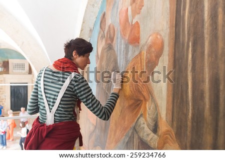 DUBROVNIK, CROATIA - MAY 26, 2014: Art conservation and restoration in the Franciscan Monastery in Dubrovnik.