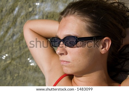 close up of woman sun bathing