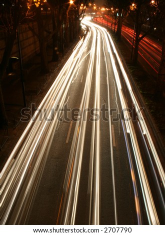 streaks of car lights on road