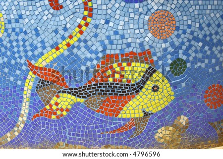 fish mosaic art on fountain pond in dahab, sinai, egypt