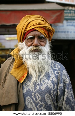 old bearded man at market, delhi, india