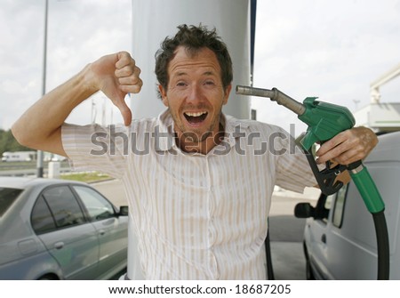 Man happy about decreasing petrol prices