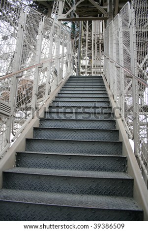 Stairs climbing the Eiffel tower  by foot to the second level