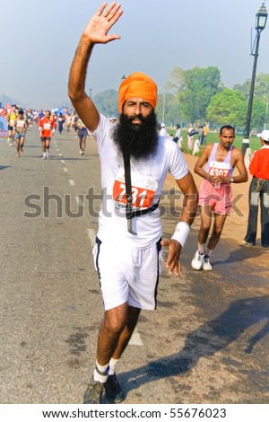 DELHI - OCTOBER 28: Young bearded Sikh man with turban competing in marathon on October 28th, 2007 in Delhi, India. The 2009 event attracted around 29,000 runners.