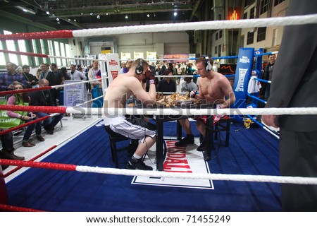 BERLIN - JANUARY 19:  Chess boxing at the Bread & Butter fair on January 19, 2011 in Berlin, Germany. Tens of thousands of visitors attended the trade show this year.