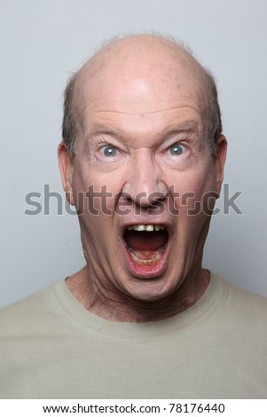 Angry man showing his teeth