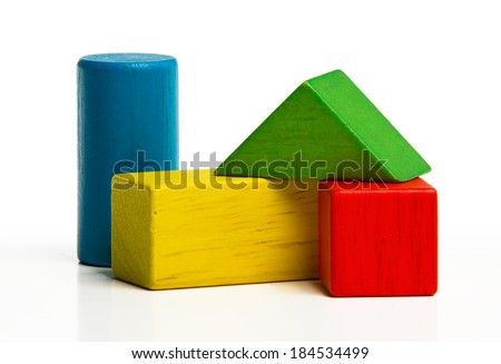 toy wooden blocks, multicolor building construction bricks over white background