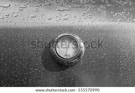 OTTAWA, CANADA - AUGUST 13: The temperature gauge on the lid of a Weber Genesis barbecue on August 13, 2013 in Ottawa, Ontario.