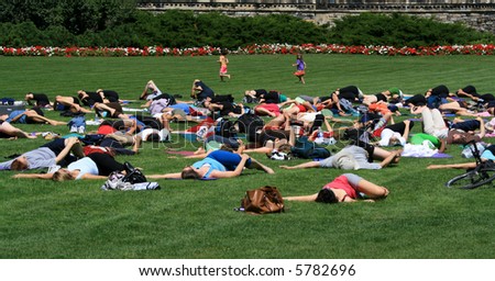 People doing yoga on Parliament Hill. Ottawa, Ontario. Canada.