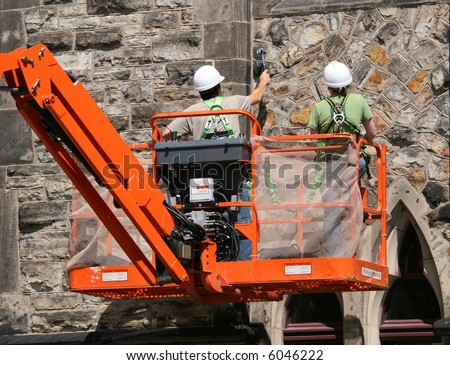 Workers inspecting the East Block of the Parliament Buildings. Parliament Hill. Ottawa, Ontario. Canada.