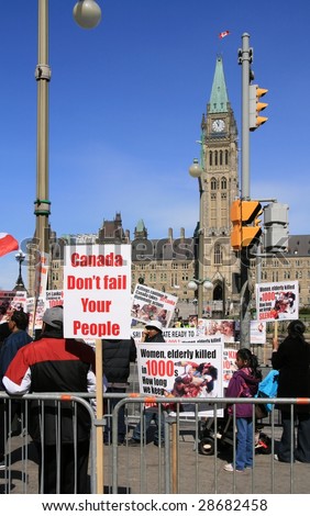 OTTAWA, ONTARIO - APRIL 17:  People protest against the civil war in Sri Lanka on April 17, 2009 in Ottawa, Ontario, Canada. The protesters demand to end attacks against Tamil citizens in Sri Lanka.
