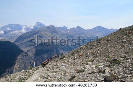A group hiking the Iceline Trail in Yoho National Park, British Columbia, Canada.
