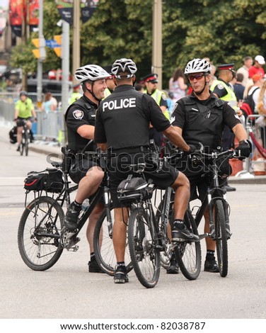 OTTAWA, CANADA - JUNE 30: Police on bikes in downtown Ottawa on June 30, 2011 prior to the arrival of William and Kate during their royal tour of Canada.