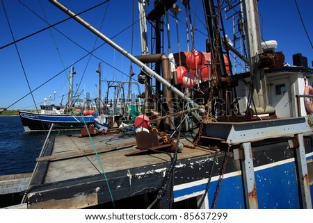 COOK’S HARBOUR, CANADA – JULY 25: Fishing boats docked on July 25, 2011 in Cook’s harbour, Newfoundland. Cook’s Harbour is one of the larger fishing ports in the region.