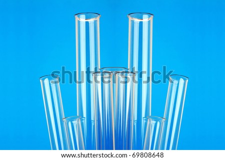Crystal from laboratory test tubes on a dark blue background