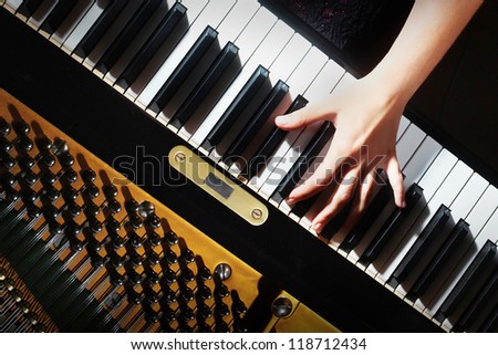 Piano keys pianist hands playing music. Musical instrument grand piano keyboard details