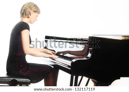 Piano playing pianist player. Woman with classical musical instrument grand piano