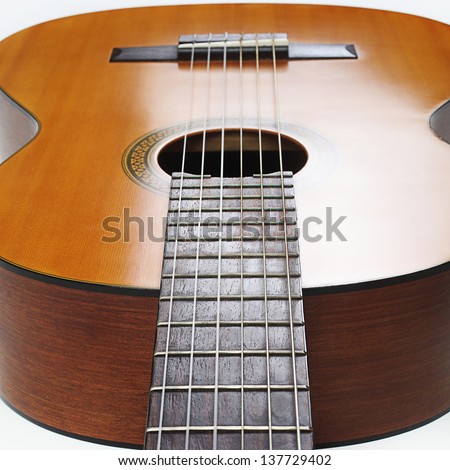 Acoustic guitar musical instrument string details close-up