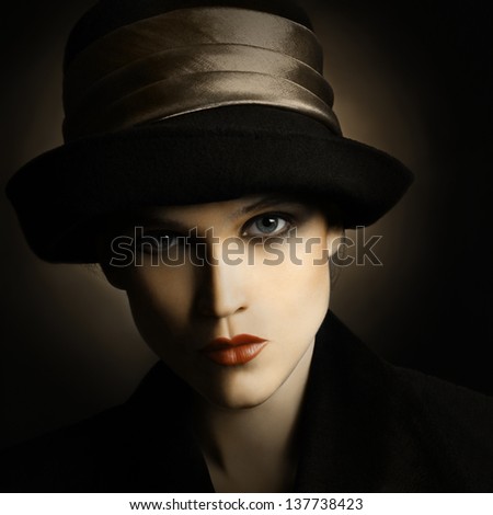Retro woman in vintage hat. Fashion portrait of elegant lady