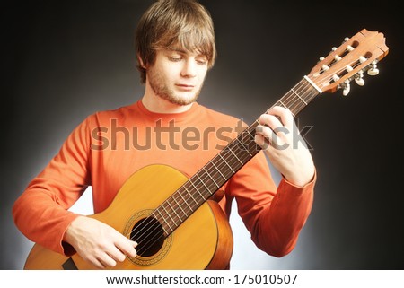 Guitar player Acoustic guitarist playing classical music instrument