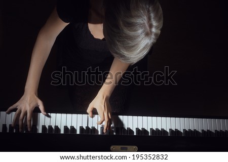 Piano player pianist playing. Musical instrument grand piano classical music concert