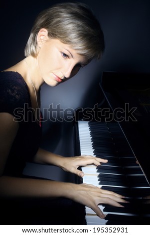 Piano player pianist playing. Musical instrument grand piano classical music concert