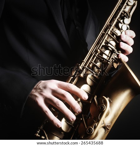 Saxophone jazz music instrument Alto sax saxophonist hands Closeup saxophone player