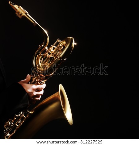 Saxophone player Jazz Music Instrument Baritone Sax isolated on black