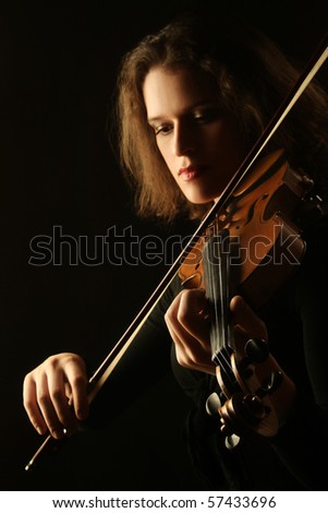 violinist musician violin player Classical music play woman hands on black background