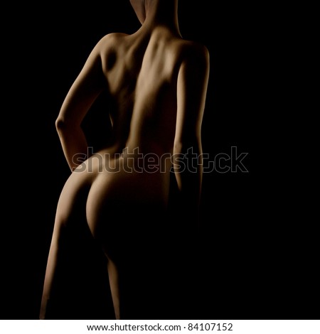 Sexy woman naked body. Nude sensual woman erotic buttocks back isolated on black