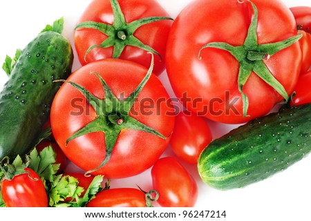 Fresh vegetables tomato cucumber. Healthy vegetable close-up isolated on white.