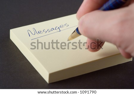 Message pad with somebody writing on it