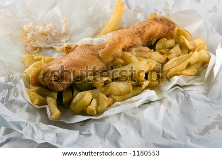 fish and chips takeaway. fish and chips in paper