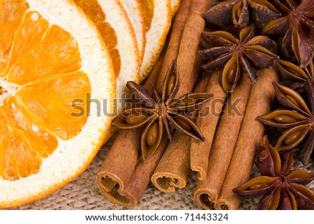 Sliced  dried orange with cinnamon sticks and anise